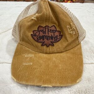 Just Keep Swimming Tan Distressed Trucker Hat